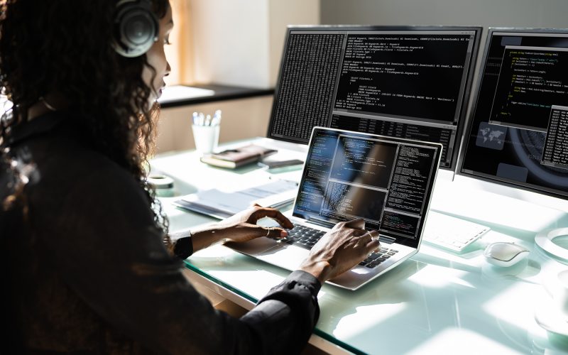 African American Woman Programmer. Girl Coding On Computer